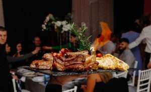 Corporate BBQ Catering Cost in Atlanta event with grilled meats served at a corporate dinner gathering