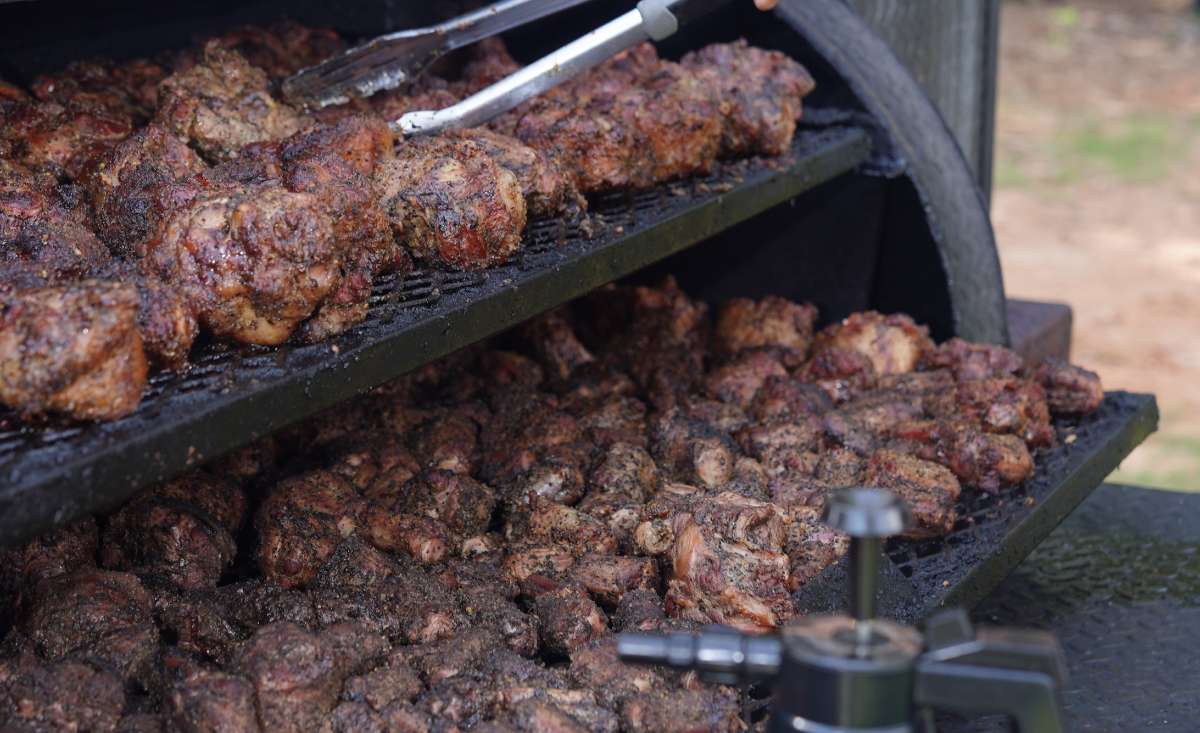Smoked oxtails in Atlanta cooking inside BBQ smoker